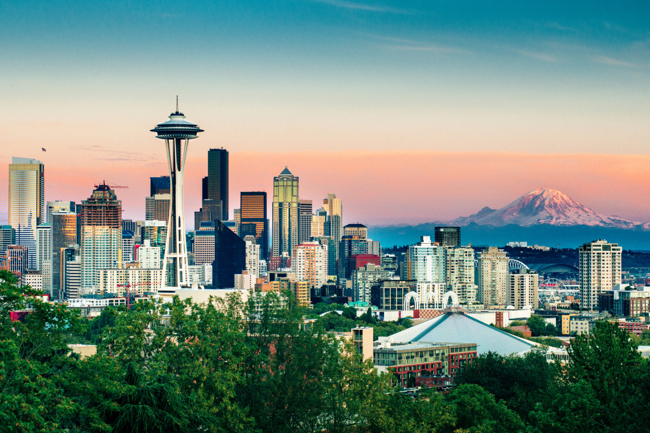 <p>Seattle Skyline and Mount Rainier at Sunset on a clear summer day.</p>